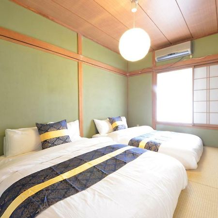 Private Room Rosso Osaka Bagian luar foto